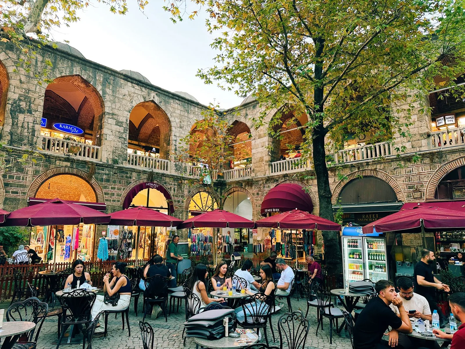 Courtyard garden seating area at a historic apartment hotel in Istanbul